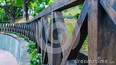 A wooden brown fence in the park Stock Photo