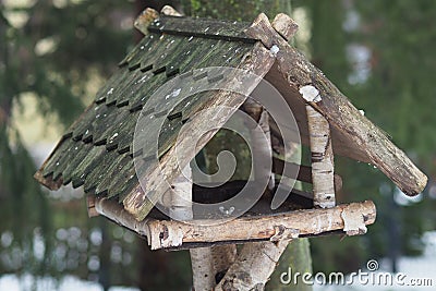 Closeup shot of a wooden house attached to a tree Stock Photo