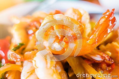 Closeup shrimp , stir-fried shrimp and basil On the plate . thai spicy food Stock Photo