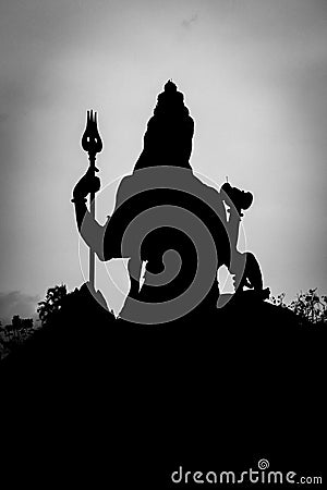 the closeup silhouette image of hindu god lord shiva with white background Stock Photo