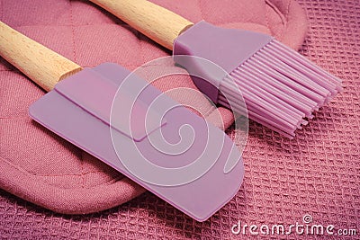 Closeup of silicone kitchen accessories, spatula and brush Stock Photo