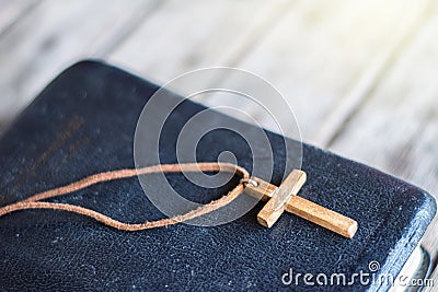 Closeup of simple wooden Christian cross necklace Stock Photo