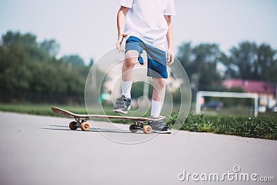 Closeup of skateboarder legs. Stock Photo