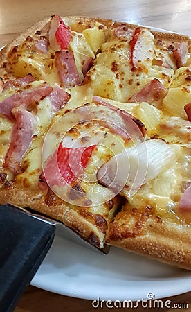 Closeup slice of pizza cheese Stock Photo