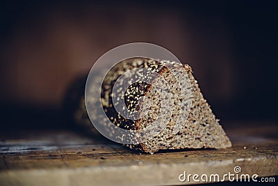 Closeup of a slice of seeded brown bread Stock Photo