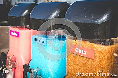 Closeup of Slush Machines with Colorful Flavors. Retro Style Stock Photo