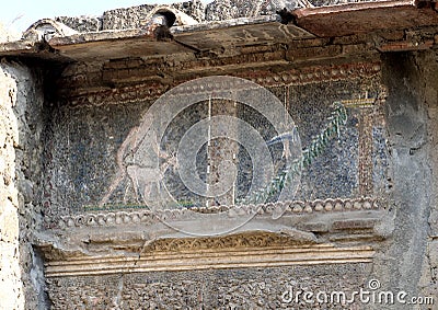 Closeup small tile mosaics, house in Parco Archeologico di Ercolano Editorial Stock Photo