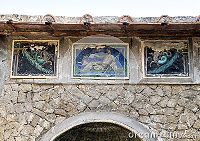 Closeup small tile mosaics, house in Parco Archeologico di Ercolano Editorial Stock Photo