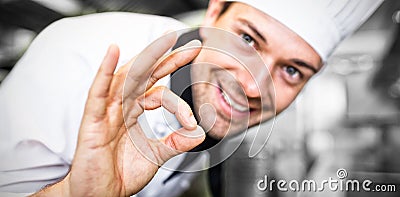 Closeup of a smiling male cook gesturing okay sign Stock Photo