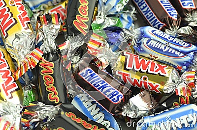 Closeup of Snickers, Mars, Bounty, Milky Way,Twix candies. Editorial Stock Photo