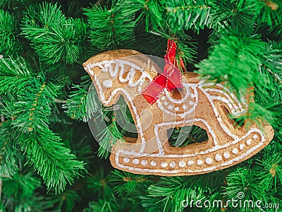 Closeup Soft focus horse gingerbread decorate on christmas tree. ChristmasDay Background Stock Photo