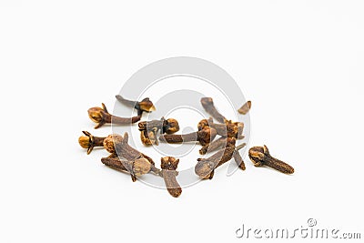 Closeup of some aromatic cloves isolated on a white background Stock Photo