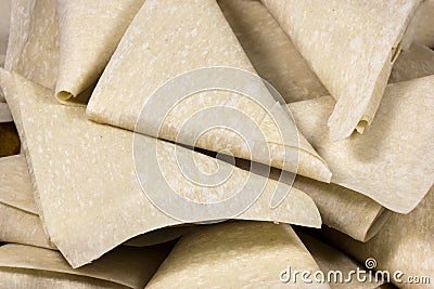 Closeup Stack of Freshly Folded Uncooked Samoosas Stock Photo