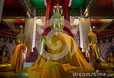 Closeup of Statues of Buddha in three directions Stock Photo