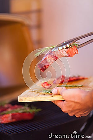 Closeup of steak fresh meat preparing on grill Stock Photo