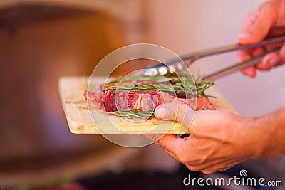 Closeup of steak fresh meat preparing on grill Stock Photo