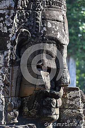 Closeup stone face of prasat Bayon temple, Angkor Thom, Cambodia Editorial Stock Photo