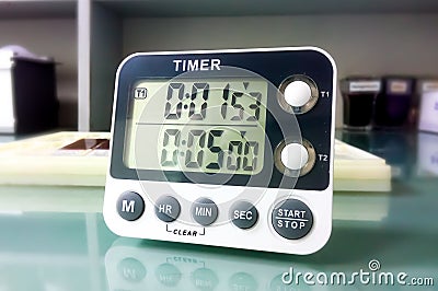 Closeup stop watch in laboratory. Timer. Laboratory test time counting concept by Stopwatch. Stock Photo