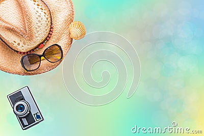 Closeup straw hat, sun glasses and vintage camera on abstract co Stock Photo