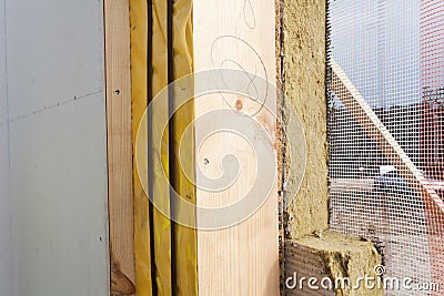 Closeup of structural Insulated Panels with mineral rockwool insulation and Drywall. Stock Photo