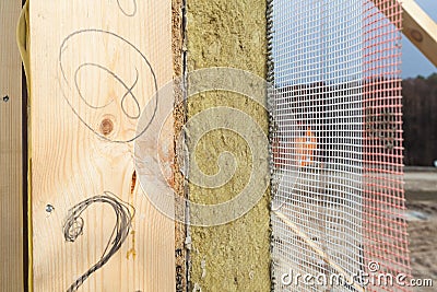 Closeup of structural Insulated Panels with mineral rockwool insulation and Drywall. Stock Photo