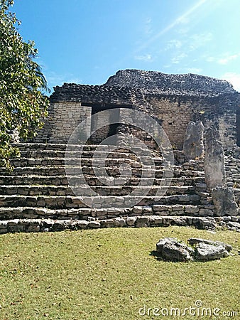 Closeup of structure on steps in Kohunlich Mayan ruins Stock Photo