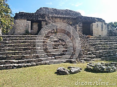 Closeup of structure on steps in Kohunlich Mayan ruins Stock Photo