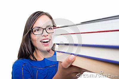 Close-up of student girl holding bunch of books Stock Photo