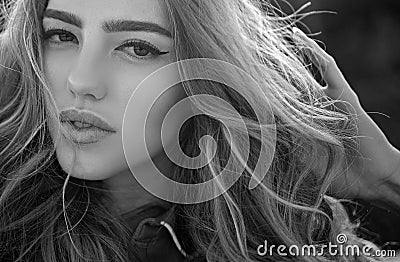 Closeup sunny portrait girl outdoor. Natural makeup. Seasonal fashion woman. Beauty and care. Stock Photo