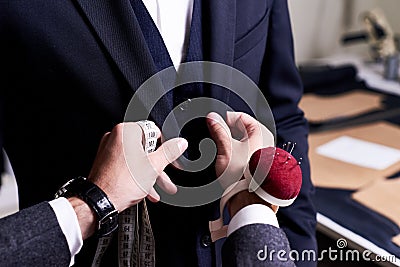 Tailor Pinning Custom Suit Stock Photo