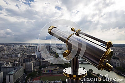 Closeup telescope on the background of Paris and the Seine River Stock Photo