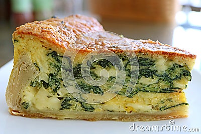 Closeup the Texture of a Slice of Homemade Spinach Quiche Stock Photo