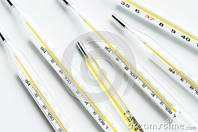 Closeup of thermometers isolated on white background Stock Photo