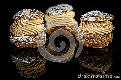 closeup three french dessert profiterole Stock Photo