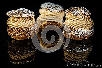closeup three french dessert shoo served on black Stock Photo