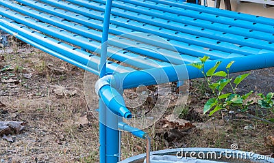 Closeup to Blue Pipes in Hydroponics Planting System Stock Photo