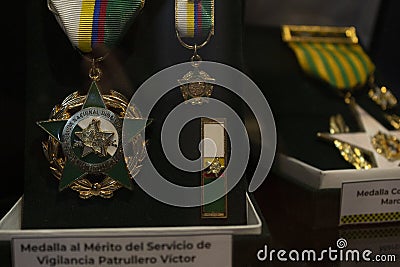 Closeup to a colombian police medals into a showcase Editorial Stock Photo