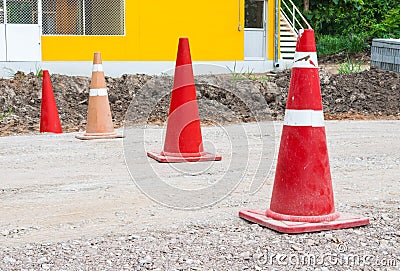 Closeup to Many Old Orange Traffic Cones in Construction Site Stock Photo