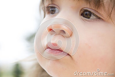 Closeup toddlers dreamy face Stock Photo