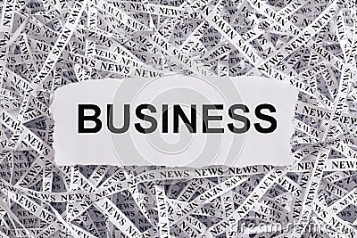 Closeup torn pieces and tapes of paper with the word BUSINESS. Stock Photo