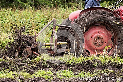 Tractor stuck in mud Stock Photo