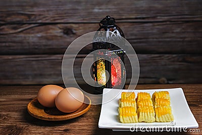 Kuih tart or pineapple tart and eggs Stock Photo