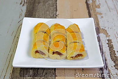 Kuih tart or pineapple tart on the wooden background Stock Photo
