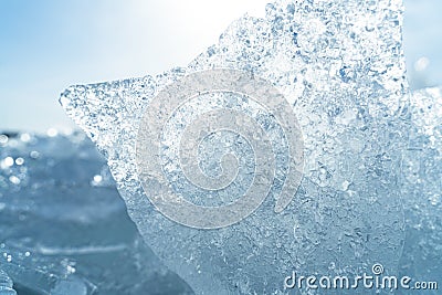 Closeup of transparent shining clear ice pieces sparkling from the sunlight Stock Photo