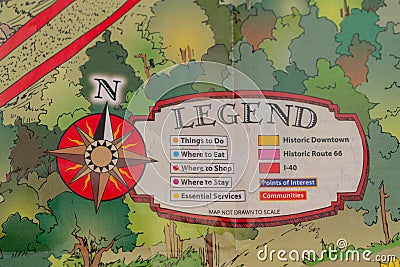 Closeup of travel map with legend and wind rose in form of a compass Stock Photo