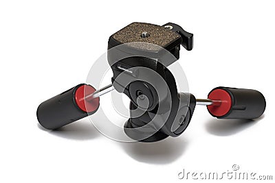 closeup tripod head red handles white background Stock Photo