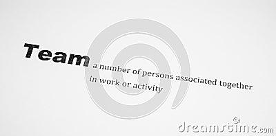 Closeup of a typed definition of the word team. Paper sheet Stock Photo