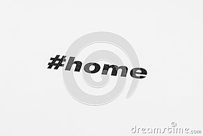 Closeup of a typed home. Heshtag word on the paper sheet Stock Photo