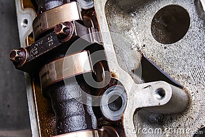 Closeup of used camshaft in car engine Stock Photo