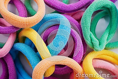 Closeup of various hair ties. Macro of multicolored elastics Stock Photo